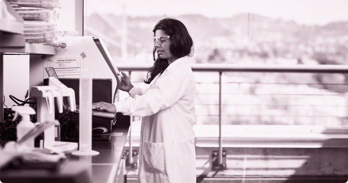 Team member working on a laptop